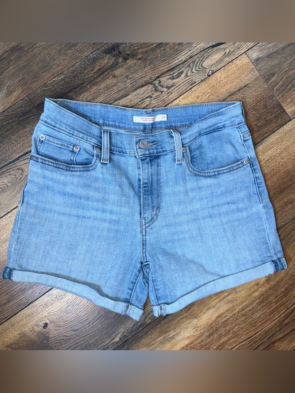 Light Wash Denim Levi Mid Length shorts